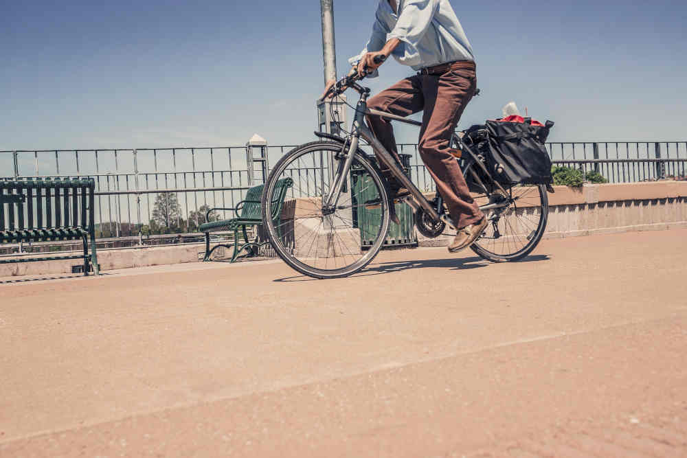 man cycling sunny