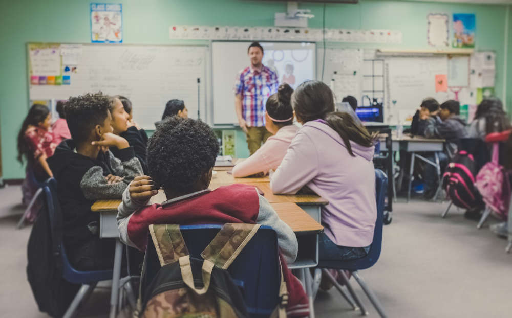 teacher in classroom with children