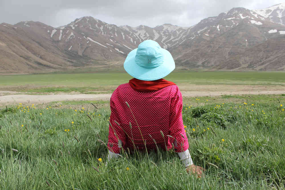 sitting looking at mountains