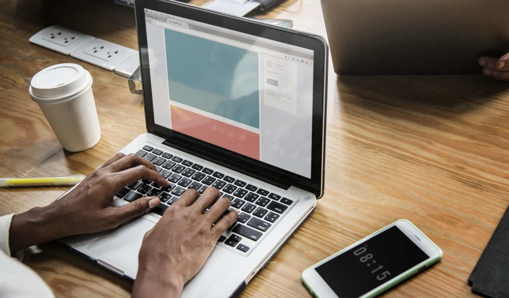 hands on laptop
