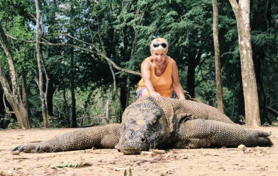 With a Komodo dragon in Indonesia
